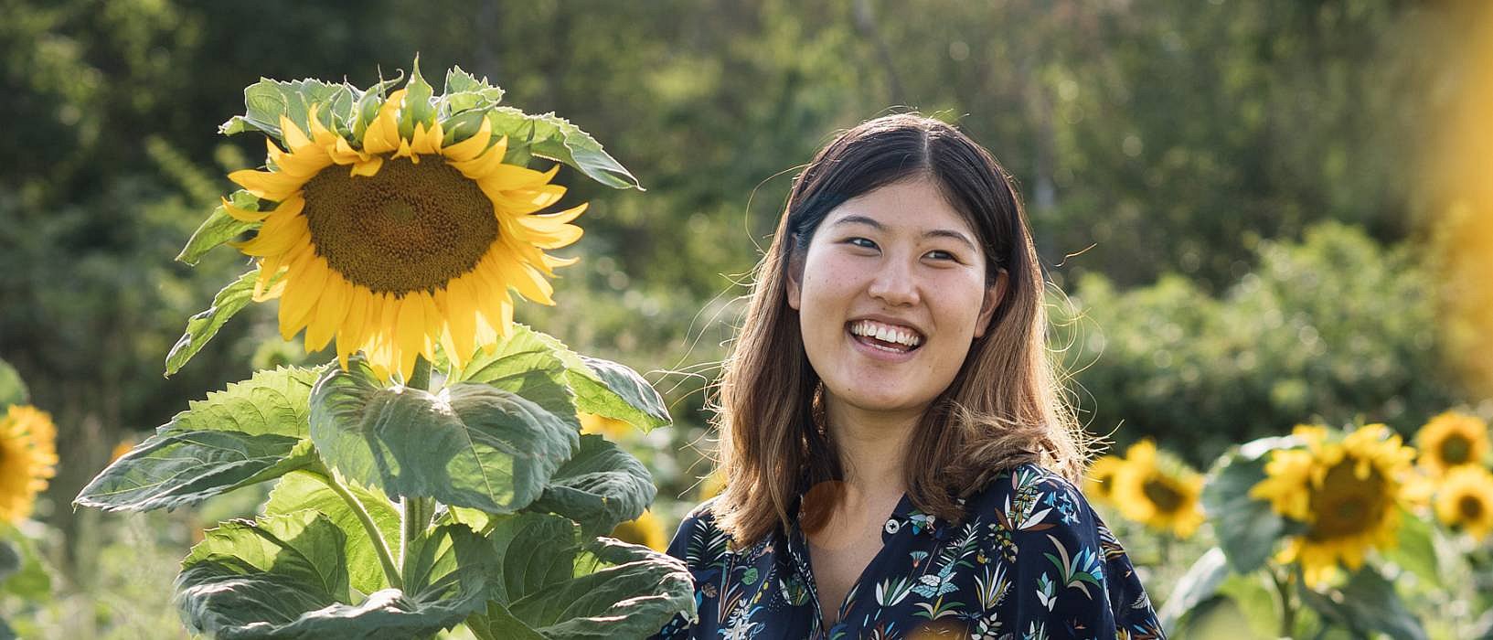 woman with sun flowers